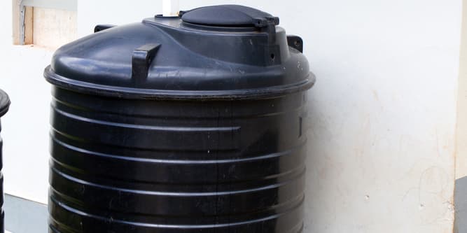How Much Chlorine Should Be Added to a Storage Tank to Kill Bacteria?