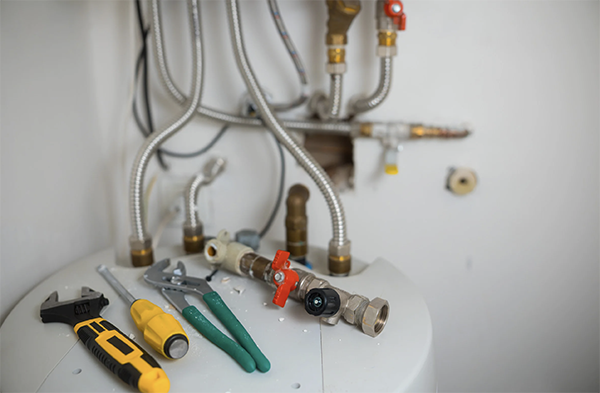 Tools shown on top of a water heater