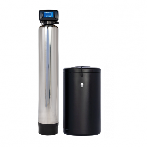 Stainless steel water softener tank with digital control head next to a black brine tank for treating hard well water.