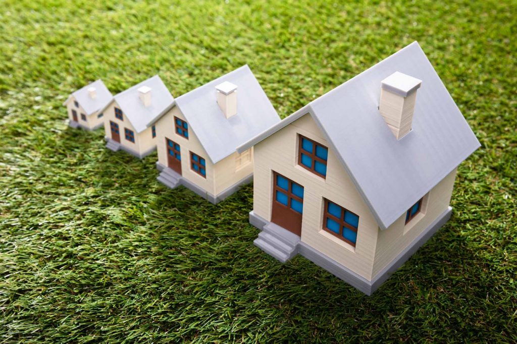 Different sized homes in a row. 