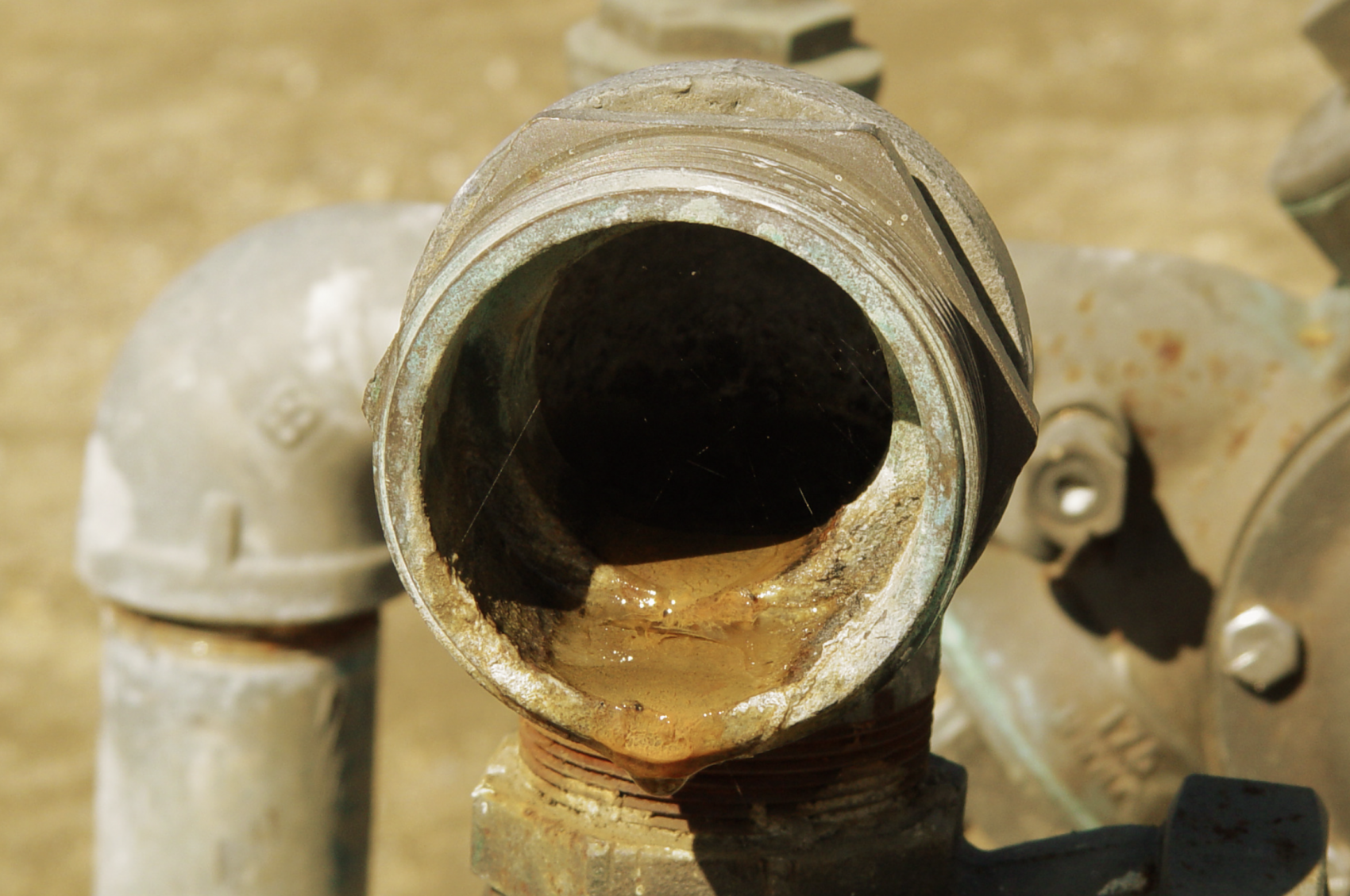 Slime, rust and orange well water is often a sign of Iron and Manganese