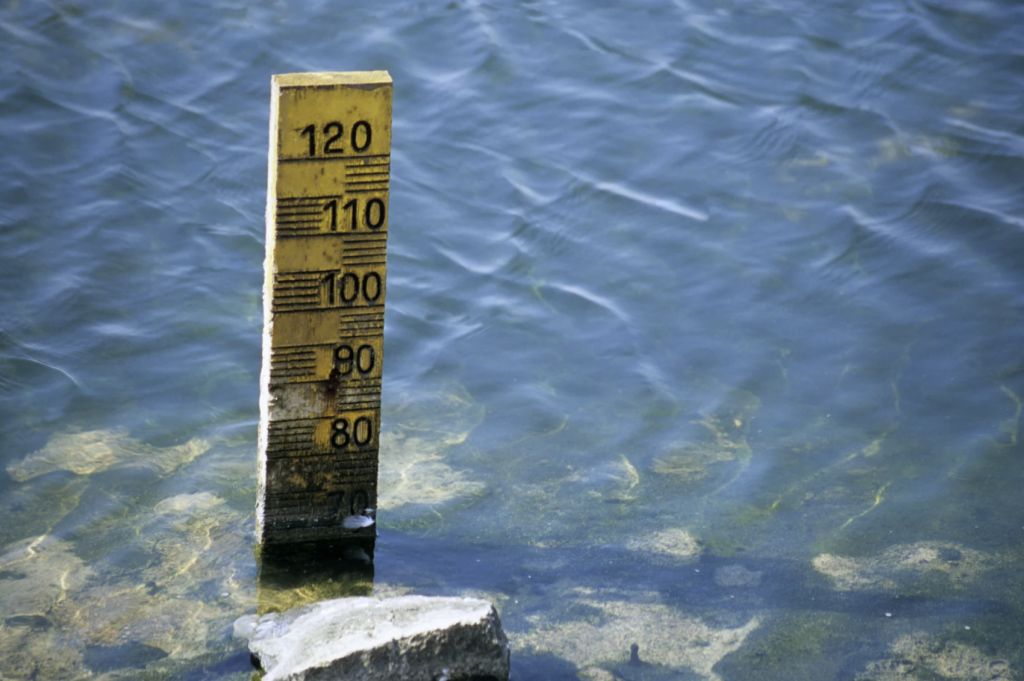 Body of water with water measurement running low for summer